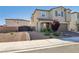 Beautiful home with desert landscaping, paved driveway and entrance at 4630 Adonis Blue St, North Las Vegas, NV 89031