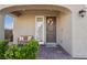 Inviting front porch with a decorated door and a cozy bench, perfect for relaxation at 4630 Adonis Blue St, North Las Vegas, NV 89031