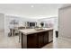 Bright, open kitchen with modern appliances and a seamless view into the dining and living areas at 4630 Adonis Blue St, North Las Vegas, NV 89031