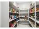 Walk-in pantry featuring an organized shelving system, perfect for storing all your groceries and essentials at 4630 Adonis Blue St, North Las Vegas, NV 89031