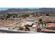 Aerial image showcases a large lot, single story house, basketball court, metal outbuilding, with community views at 5315 N Fort Apache Rd, Las Vegas, NV 89149