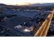 The aerial view showcases an outdoor basketball court alongside a storage building on this expansive property at 5315 N Fort Apache Rd, Las Vegas, NV 89149