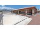 Large concrete pad in the backyard, next to a building with a basketball hoop at 5315 N Fort Apache Rd, Las Vegas, NV 89149