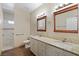 Updated bathroom with double vanity, granite countertops, and walk-in shower with tiled surround at 5315 N Fort Apache Rd, Las Vegas, NV 89149