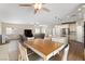 Open concept living and dining area featuring updated floors, neutral paint, and ample natural light at 5315 N Fort Apache Rd, Las Vegas, NV 89149