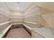 Walk-in pantry with custom shelving and counter space for food storage and organization at 5315 N Fort Apache Rd, Las Vegas, NV 89149