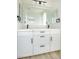 Bathroom featuring white cabinets and modern black hardware at 5345 Tustin Hills St, North Las Vegas, NV 89081