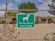 This dog park at Cortez Heights has a sign, trees, and a fenced in area at 5345 Tustin Hills St, North Las Vegas, NV 89081