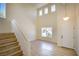 Hallway with stairs and clerestory windows offering an abundance of natural light at 5345 Tustin Hills St, North Las Vegas, NV 89081