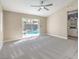Spacious bedroom with plush carpet, and backyard access to a refreshing pool at 5436 Red Sun Dr, Las Vegas, NV 89149