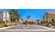Gated community entrance with lush landscaping and well-maintained grounds at 5436 Red Sun Dr, Las Vegas, NV 89149