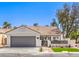 Inviting single-story home with a two-car garage, gate and xeriscaped front yard at 5436 Red Sun Dr, Las Vegas, NV 89149