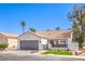 Charming single-story home with a two-car garage and a neatly landscaped front yard at 5436 Red Sun Dr, Las Vegas, NV 89149