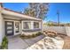 Cozy front entrance with seating area and desert-friendly landscaping at 5436 Red Sun Dr, Las Vegas, NV 89149