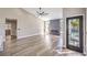 Spacious living room featuring high ceilings, a modern fireplace, and ample natural light at 5436 Red Sun Dr, Las Vegas, NV 89149