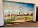 Painted Desert wall display showcases the neighborhood features, including golf and racquetball courts at 5436 Red Sun Dr, Las Vegas, NV 89149
