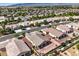 Aerial view of the home and neighborhood with mountain views at 5500 E Volterra Dr, Pahrump, NV 89061