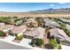 Overhead view of a well-maintained neighborhood with desert landscape, and mountain range at 5500 E Volterra Dr, Pahrump, NV 89061