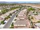Expansive aerial view of the desert community showcasing mountain views in the distance at 5500 E Volterra Dr, Pahrump, NV 89061