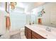 Well-lit bathroom featuring modern fixtures, a vanity with storage, and stylish decor at 5500 E Volterra Dr, Pahrump, NV 89061