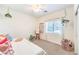 Cozy bedroom with ample natural light, neutral walls, and modern decor at 5500 E Volterra Dr, Pahrump, NV 89061