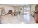 Spacious open-concept living area with lots of natural light and comfortable seating at 5500 E Volterra Dr, Pahrump, NV 89061