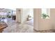 Open-concept design featuring stylish tile flooring that connects the living spaces at 5500 E Volterra Dr, Pahrump, NV 89061