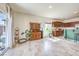 Open concept living area combines the kitchen and living spaces for modern living at 5500 E Volterra Dr, Pahrump, NV 89061