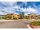Upscale restaurant and bar exterior with landscaped grounds under a partly cloudy blue sky at 5500 E Volterra Dr, Pahrump, NV 89061