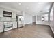 Spacious open kitchen with stainless steel appliances, lots of counter space and gray cabinetry at 5575 Cresent Valley St, Las Vegas, NV 89148