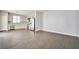 Living area showcasing tile flooring and an open concept into the kitchen at 5575 Cresent Valley St, Las Vegas, NV 89148