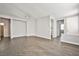 Open living room with tile floors leading to the entryway at 5575 Cresent Valley St, Las Vegas, NV 89148