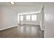 Spacious living room with tile floors and bright natural light at 5575 Cresent Valley St, Las Vegas, NV 89148