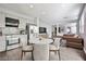Bright, open floor plan with views of the modern kitchen and living spaces at 5575 Cresent Valley St, Las Vegas, NV 89148