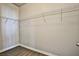 Empty walk-in closet featuring neutral paint and wire shelving for organized storage at 5575 Cresent Valley St, Las Vegas, NV 89148