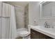 The bathroom offers a shower and tub combination with tile surround, modern vanity, and a framed mirror at 5725 Smoke Ranch Rd # A, Las Vegas, NV 89108