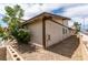 This home's exterior features a neutral color scheme, well-maintained landscaping, and a low-maintenance yard at 5725 Smoke Ranch Rd # A, Las Vegas, NV 89108