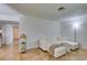 Comfortable living room featuring a sectional sofa, open layout with adjacent dining and entry areas at 5725 Smoke Ranch Rd # A, Las Vegas, NV 89108