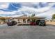 This outdoor parking area offers covered parking spots with neighborhood views at 5725 Smoke Ranch Rd # A, Las Vegas, NV 89108