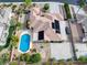 Expansive aerial view of the home with a private backyard pool and drought-resistant landscaping at 5858 Majestic Tide Ave, Las Vegas, NV 89131