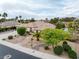 Aerial view of home with swimming pool, mature landscaping, and well maintained exterior at 5858 Majestic Tide Ave, Las Vegas, NV 89131