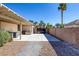 A spacious backyard featuring a large patio area, perfect for outdoor entertaining and relaxation at 5858 Majestic Tide Ave, Las Vegas, NV 89131