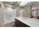 Modern bathroom boasts a walk-in shower, updated vanity, and spacious design at 5858 Majestic Tide Ave, Las Vegas, NV 89131