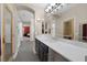 Bathroom features long countertop with sink and dark cabinetry at 5858 Majestic Tide Ave, Las Vegas, NV 89131