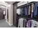 Custom closet with hanging racks, drawers, and cabinets at 5858 Majestic Tide Ave, Las Vegas, NV 89131