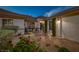 Charming single-story home with desert landscaping, mature trees, and a welcoming front entrance at 5858 Majestic Tide Ave, Las Vegas, NV 89131