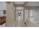 Hallway with tile floors and archway to other rooms at 5858 Majestic Tide Ave, Las Vegas, NV 89131