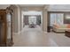 Bright and airy living space seamlessly connecting the living room and dining area at 5858 Majestic Tide Ave, Las Vegas, NV 89131