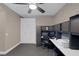 Office with built in cabinets, desk, and ceiling fan at 5858 Majestic Tide Ave, Las Vegas, NV 89131