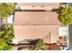 Birds eye view of a private residence featuring a terracotta roof, mature trees and outdoor living space at 6046 Bassio Ave, Las Vegas, NV 89141